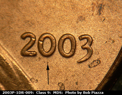 Die-stage B marker on 2003P•1DR•009 (2003 Doubled Die Reverse).