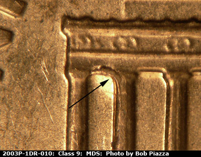 Die-stage B marker on 2003P•1DR•010 (2003 Doubled Die Reverse).
