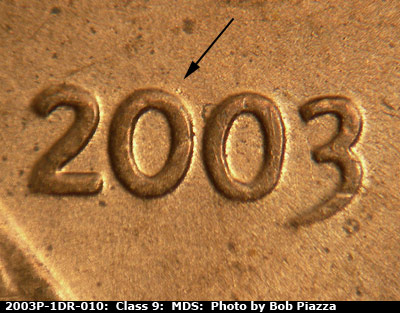 Die-stage B marker on 2003P•1DR•010 (2003 Doubled Die Reverse).