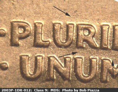 Die-stage B marker on 2003P•1DR•012 (2003 Doubled Die Reverse).