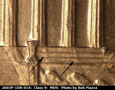 Die-stage B marker on 2003P•1DR•014 (2003 Doubled Die Reverse).