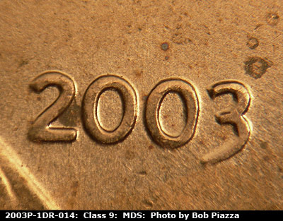 Die-stage B marker on 2003P•1DR•014 (2003 Doubled Die Reverse).