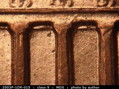 Die-stage B marker on 2003P•1DR•015 (2003 Doubled Die Reverse).