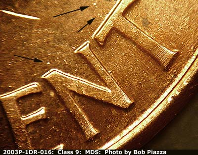 Die-stage B marker on 2003P•1DR•016 (2003 Doubled Die Reverse).