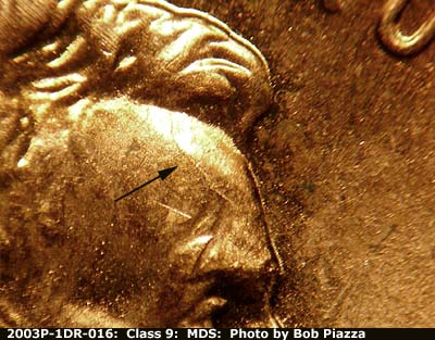 Die-stage B marker on 2003P•1DR•016 (2003 Doubled Die Reverse).