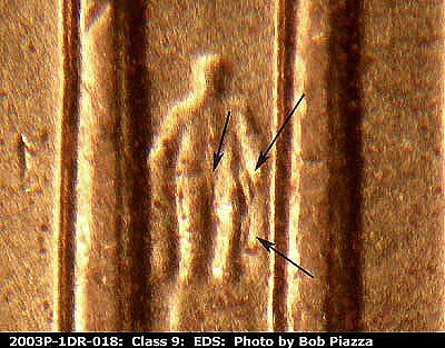 Die-stage A marker on 2003P•1DR•018 (2003 Doubled Die Reverse).