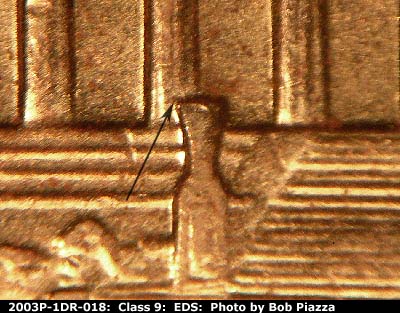 Die-stage A marker on 2003P•1DR•018 (2003 Doubled Die Reverse).