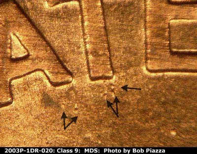 Die-stage B marker on 2003P•1DR•020 (2003 Doubled Die Reverse).
