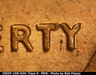 Die-stage B marker on 2003P•1DR•020 (2003 Doubled Die Reverse).