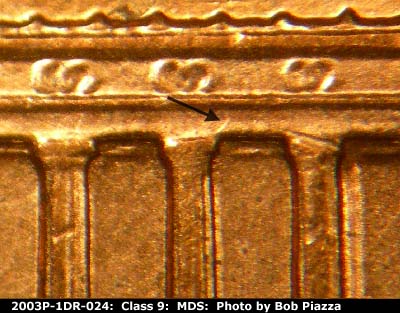 Die-stage B marker on 2003P•1DR•024 (2003 Doubled Die Reverse).