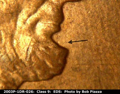 Die-stage A marker on 2003P•1DR•026 (2003 Doubled Die Reverse).