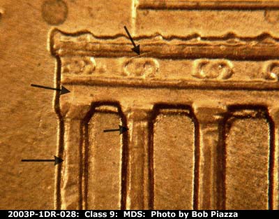 Die-stage B marker on 2003P•1DR•028 (2003 Doubled Die Reverse).