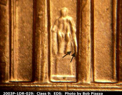 Die-stage A marker on 2003P•1DR•029 (2003 Doubled Die Reverse).
