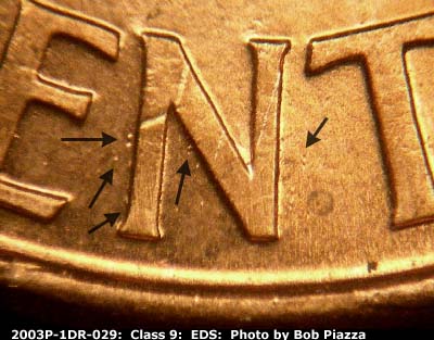 Die-stage A marker on 2003P•1DR•029 (2003 Doubled Die Reverse).