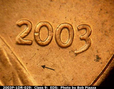 Die-stage A marker on 2003P•1DR•029 (2003 Doubled Die Reverse).