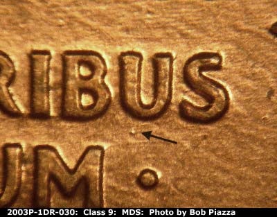 Die-stage B marker on 2003P•1DR•030 (2003 Doubled Die Reverse).