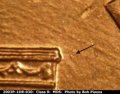 Die-stage B marker on 2003P•1DR•030 (2003 Doubled Die Reverse).