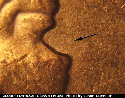 Die-stage B marker on 2003P•1DR•032 (2003 Doubled Die Reverse).