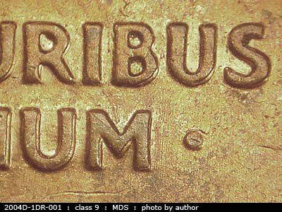 Die-stage B marker on 2004D•1DR•001 (2004 Doubled Die Reverse).