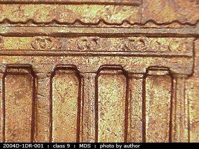 Die-stage B marker on 2004D•1DR•001 (2004 Doubled Die Reverse).
