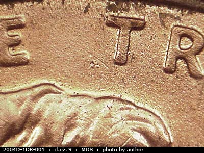 Die-stage B marker on 2004D•1DR•001 (2004 Doubled Die Reverse).