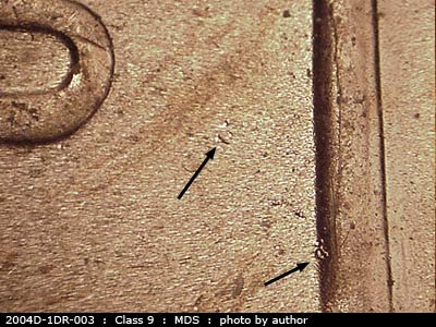 Die-stage B marker on 2004D•1DR•003 (2004 Doubled Die Reverse).