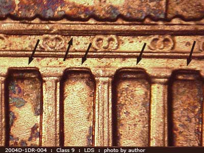 Die-stage C marker on 2004D•1DR•004 (2004 Doubled Die Reverse).