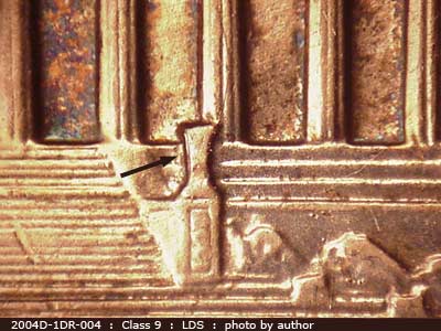 Die-stage C marker on 2004D•1DR•004 (2004 Doubled Die Reverse).