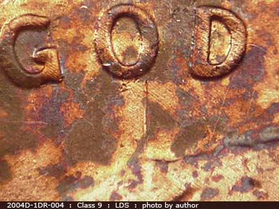 Die-stage C marker on 2004D•1DR•004 (2004 Doubled Die Reverse).