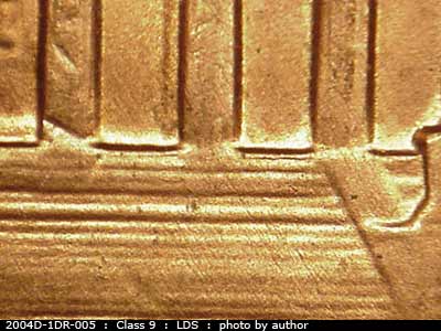 Die-stage C marker on 2004D•1DR•005 (2004 Doubled Die Reverse).
