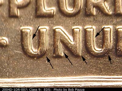 Die-stage A marker on 2004D•1DR•007 (2004 Doubled Die Reverse).
