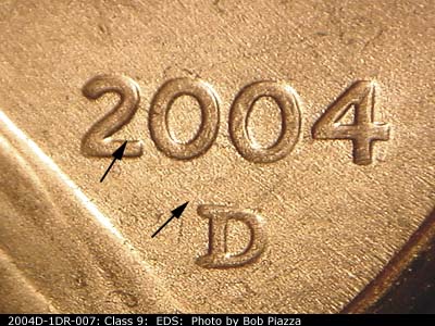 Die-stage A marker on 2004D•1DR•007 (2004 Doubled Die Reverse).