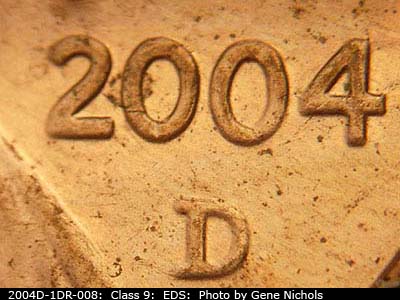 Die-stage A marker on 2004D•1DR•008 (2004 Doubled Die Reverse).