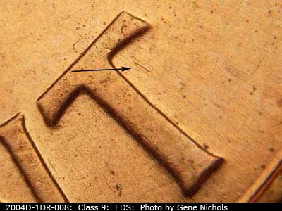 Die-stage A marker on 2004D•1DR•008 (2004 Doubled Die Reverse).