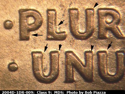 Die-stage B marker on 2004D•1DR•009 (2004 Doubled Die Reverse).