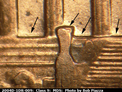 Die-stage B marker on 2004D•1DR•009 (2004 Doubled Die Reverse).