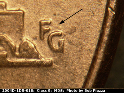 Die-stage B marker on 2004D•1DR•010 (2004 Doubled Die Reverse).