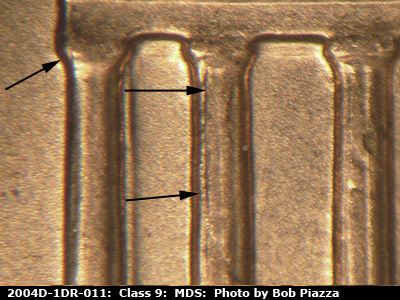 Die-stage B marker on 2004D•1DR•011 (2004 Doubled Die Reverse).