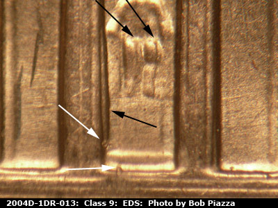 Die-stage A marker on 2004D•1DR•013 (2004 Doubled Die Reverse).