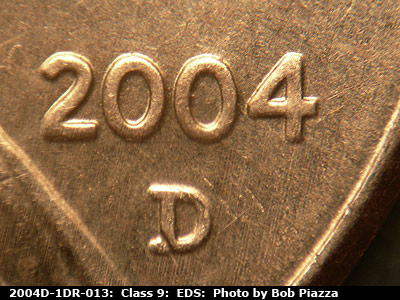 Die-stage A marker on 2004D•1DR•013 (2004 Doubled Die Reverse).