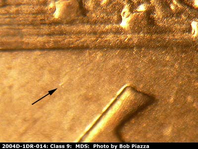 Die-stage B marker on 2004D•1DR•014 (2004 Doubled Die Reverse).