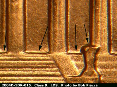 Die-stage C marker on 2004D•1DR•015 (2004 Doubled Die Reverse).