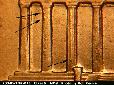 Die-stage B marker on 2004D•1DR•016 (2004 Doubled Die Reverse).