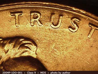 Die-stage B marker on 2004P•1DO•001 (2004 Doubled Die Obverse).