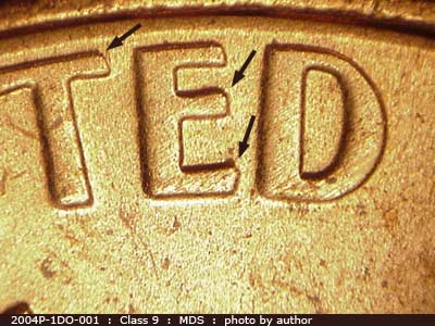 Die-stage B marker on 2004P•1DO•001 (2004 Doubled Die Obverse).