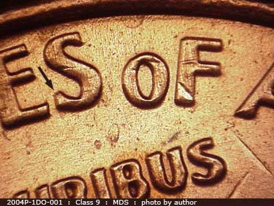 Die-stage B marker on 2004P•1DO•001 (2004 Doubled Die Obverse).