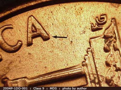 Die-stage B marker on 2004P•1DO•001 (2004 Doubled Die Obverse).