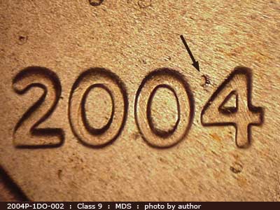 Die-stage B marker on 2004P•1DO•002 (2004 Doubled Die Obverse).