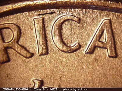 Die-stage B marker on 2004P•1DO•004 (2004 Doubled Die Obverse).