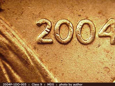 Die-stage B marker on 2004P•1DO•005 (2004 Doubled Die Obverse).